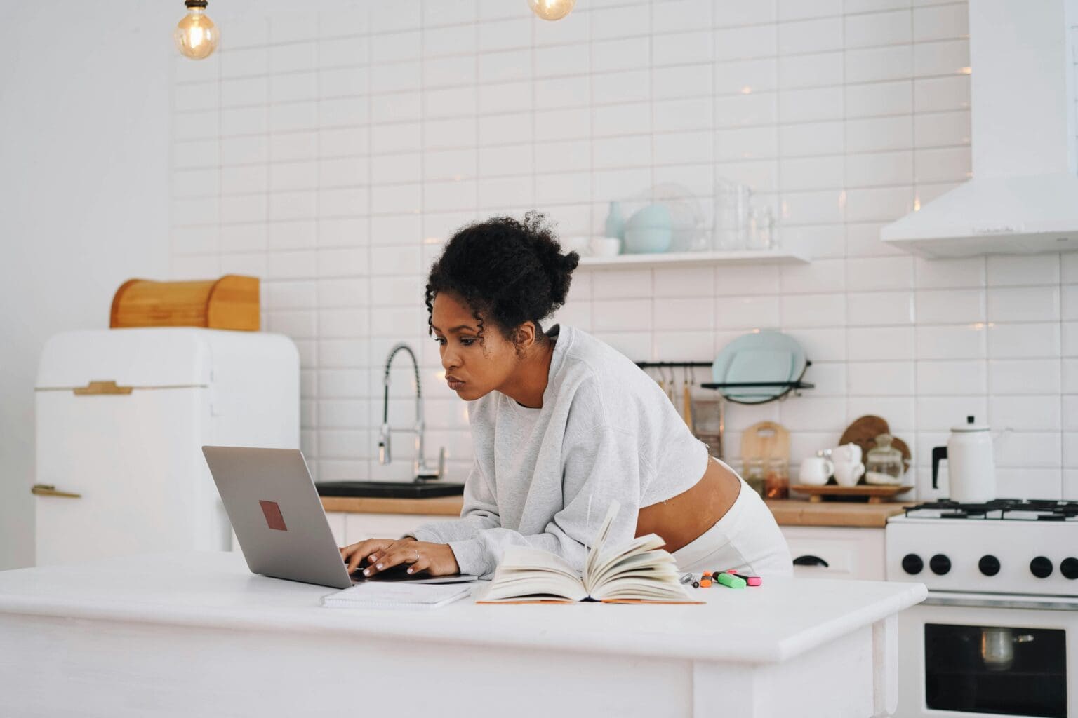 image of a woman looking at a website using her cell phone